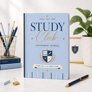 May include: A light blue hardcover assignment journal titled Study Club with gold and dark blue text, a central crest featuring a book and quill, and the phrase Every Day Is A Fresh Start on a banner. The cover includes stars and vertical stripes.