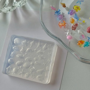 Molde de silicone 3D para unhas com tema de vida marinha, pingentes de resina com conchas e estrelas-do-mar.