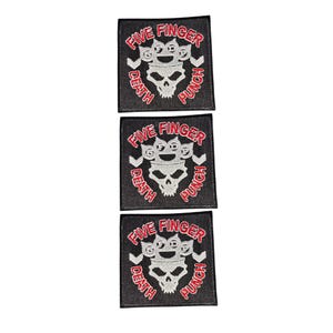 May include: Three square black embroidered patches featuring a white skull and brass knuckles graphic. The text Five Finger Death Punch is stitched in red thread around the central design. Each patch has a black border and a white chevron symbol.