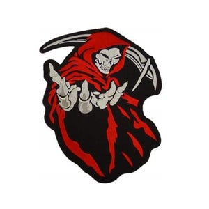 May include: A black and red patch featuring a Grim Reaper figure. The Reaper is depicted with a skull face, a red hooded cloak, and skeletal hands reaching out. A silver scythe is visible.