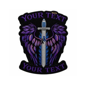 May include: A black patch with purple and blue embroidered design. The design features a sword, wings, and a ribbon. The text "YOUR TEXT" is arched across the top and bottom of the patch.