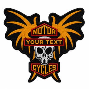 May include: A black and orange embroidered patch with a skull and wings design. The patch features the words "MOTOR", "YOUR TEXT", and "CYCLES" in a red and white color scheme. The wings are orange and the skull is white.