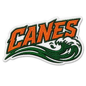 May include: Embroidered patch featuring the word "CANES" in orange, outlined in green and white. A green and white wave design is below the word, creating a dynamic and sporty look. The patch is likely for apparel or accessories.