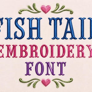May include: An embroidery design featuring the text FISH TAIL in blue, EMBROIDERY in pink, and FONT in purple. The design includes two pink hearts and green decorative flourishes above and below the text, all set against a light cream background.