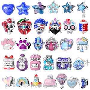 May include: A collection of assorted metal charms for bracelets, featuring various shapes including skulls, stars, hearts, animals, and objects like perfume bottles, treasure chests, and rockets, decorated with colorful enamel and small clear stones.
