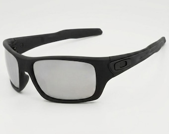 Gafas de sol polarizadas Oakley estilo turbina: montura negra, protección UV400.