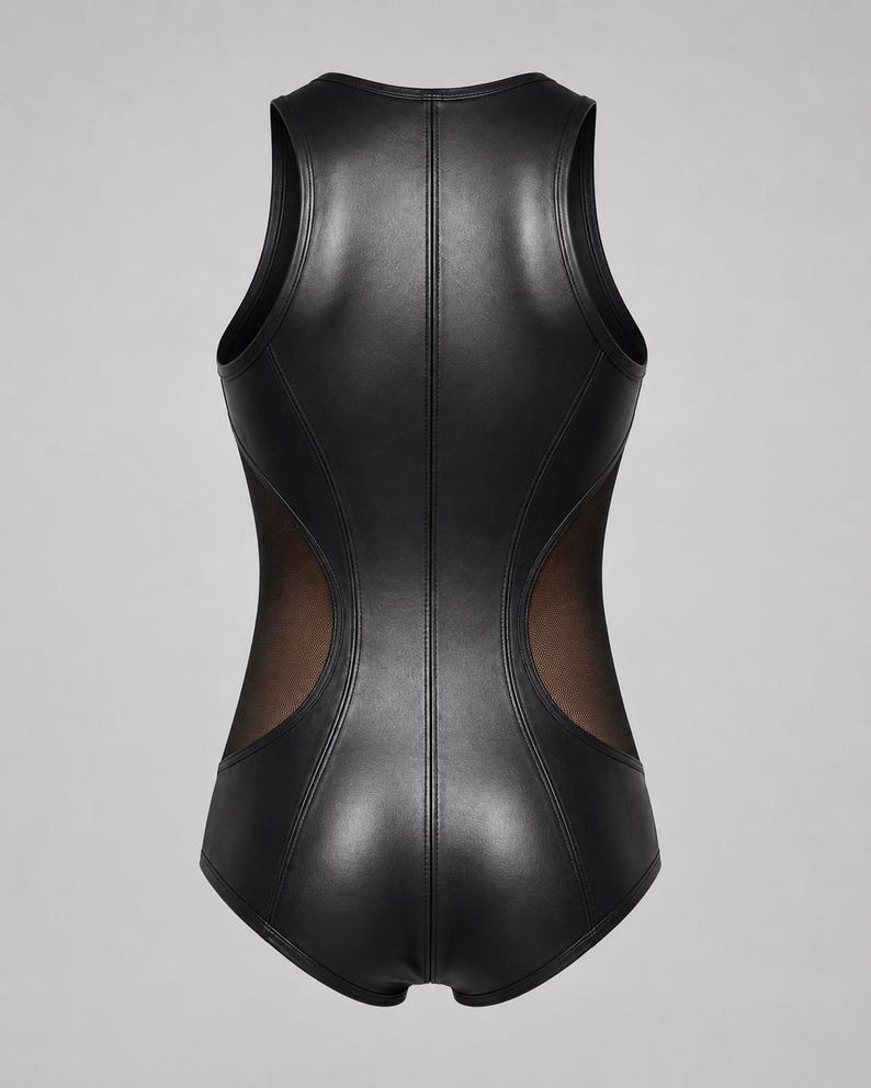 May include: A sleeveless black bodysuit featuring a smooth, leather-like finish with vertical seam detailing down the center. The garment includes sheer mesh panels along both sides of the torso, extending from the armholes to the hip area.