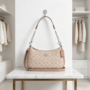 Coach classic canvas Teri Hobo shoulder bag, khaki convertible to crossbody, silver hardware, a luxurious everyday handbag for women.