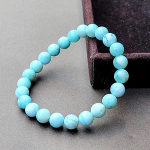 Natürliches Larimar-Armband (7 mm x 8 mm), echte Ozeanwellen-Steinperlen aus der Dominikanischen Republik, seltener blauer Atlantis-Edelsteinschmuck, ein beruhigendes Geschenk