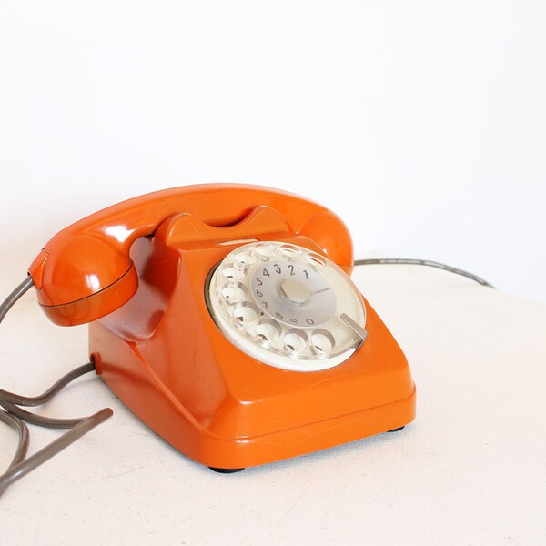 Vintage rotary telephone tangerine tango