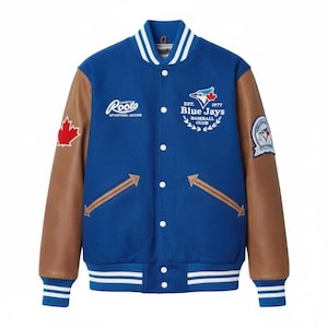 May include: A blue varsity jacket with brown leather sleeves, featuring white striped ribbed trim at the collar, cuffs, and hem. The front displays white snap buttons, two pockets, a Roots logo, and a Blue Jays Baseball Club emblem with text.