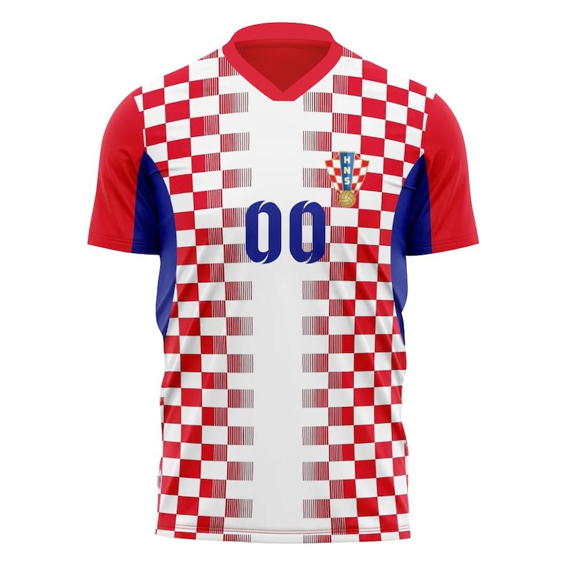 May include: A red, white, and blue soccer jersey with the number "00" on the front. The jersey features a checkered pattern on the front and sleeves, with a Croatian emblem on the chest. The sleeves are red, and the collar is a V-neck.