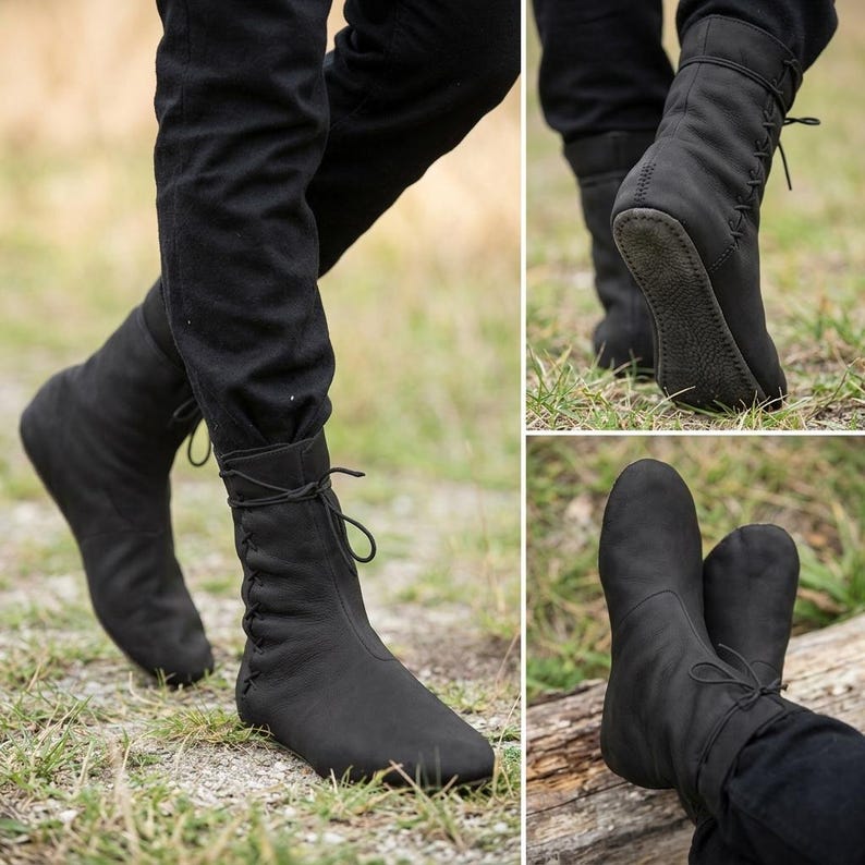May include: A pair of black leather ankle boots featuring a side-lacing design with thin black laces, a rounded toe, and a flat, textured sole. The boots extend above the ankle and are secured with a tie closure at the top of the side panel.