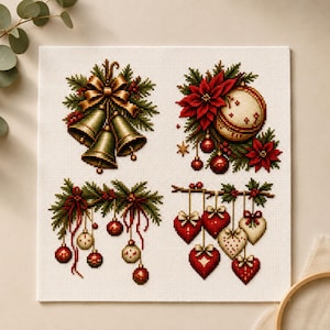 May include: A square piece of white Aida fabric featuring four distinct cross-stitch patterns. The designs include gold bells with a bow, a poinsettia with a round ornament, a pine branch with hanging baubles, and a branch with heart-shaped ornaments.