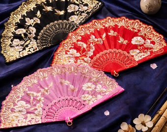 Elegante abanico japonés con estampado floral dorado | Accesorio chic y decoración zen