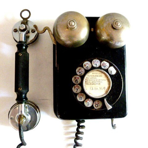 1930s Antique wall telephone. Ericsson vintage rotary wall phone.France