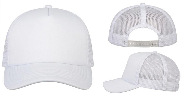 May include: A white trucker hat with a curved brim and a mesh back. The hat has a solid front panel and an adjustable snap closure. The hat is shown from multiple angles.