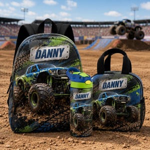 May include: A backpack, a lunch bag, and a water bottle featuring a blue monster truck graphic, mud splatters, and the name DANNY printed on metallic-style plates. The items have black accents and a green and blue color scheme throughout.