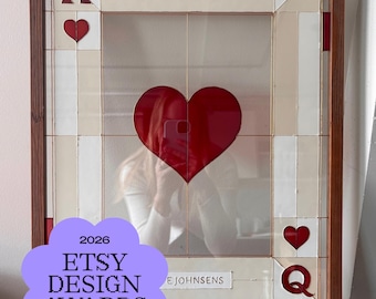 May include: A rectangular stained glass wall art piece framed in wood, designed as a playing card with a large central red heart. It features the letter K, the letter Q, smaller red hearts, and white rectangular panels with the text 09.12.2026 and THE JOHNSENS.