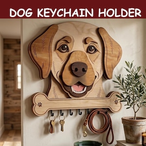 Op de afbeelding: Houten honden sleutelhangerhouder met de tekst "DOG KEYCHAIN HOLDER". De houder is gevormd als een hondenhoofd met een botvormige sleutelrek. Inclusief haken voor sleutels en een riem. Het gezicht van de hond is licht- en donkerbruin.