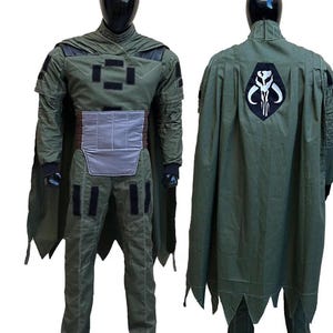 Hunter green Mandalorian costume for men featuring a detailed flight suit and custom cape. Inspired by Din Djarin cosplay and bounty hunter style, this Star Wars cosplay outfit is ideal for Comic Con, Halloween, cosplay conventions, fan events, themed parties, and collectors. Adult sci fi costume with realistic flight suit details, custom tailoring options, and premium craftsmanship designed for immersive cosplay, display, and costume enthusiasts.