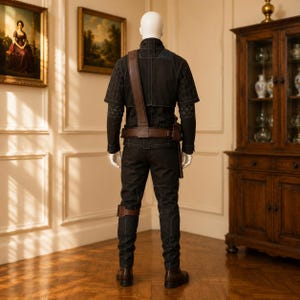 Buy Din Djarin Mandalorian flight suit costume back view. Premium black two-piece cosplay set with diamond pattern stitching on sleeves, brown leather bandolier, tactical belt, side holster and knee armor. Handmade to order Star Wars bounty hunter costume. Shop now for Comic Con Halloween and convention events. Custom sizing available worldwide shipping.