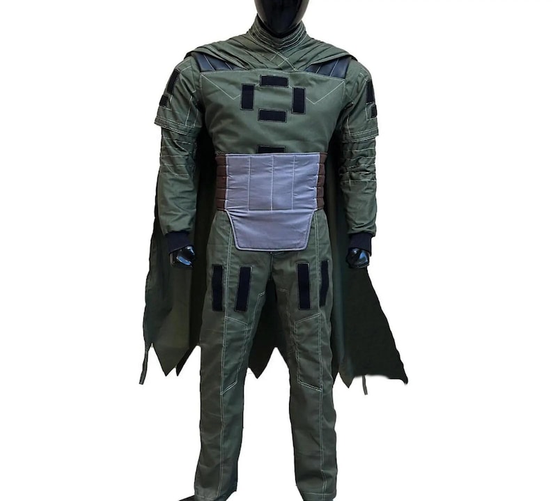 Mandalorian inspired hunter green flight suit costume for men with custom cape and detailed bounty hunter design. Perfect for Star Wars cosplay, Din Djarin inspired cosplay, Comic Con events, Halloween costumes, cosplay conventions, fan gatherings, and themed photoshoots. Features a realistic sci fi flight suit, custom sizing options, premium craftsmanship, and screen inspired styling for collectors, cosplayers, and costume enthusiasts seeking an immersive galactic adventure look.