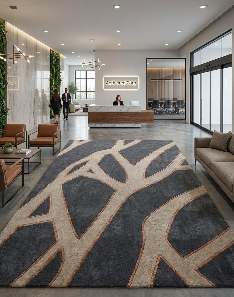 May include: An office lobby featuring a large, patterned rug in shades of gray and beige. The rug's design resembles a network of branches. The reception desk has a marble top and the sign above it reads "Aethelred Corp."