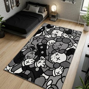 Könnte beinhalten: Ein rechteckiger Teppich mit einem sich wiederholenden schwarz-weiß-grauen Grafikmuster aus Cartoon-Figuren mit X-förmigen Augen und behandschuhten Händen. Das Design ist dicht mit überlappenden Figuren in einem monochromen Farbschema gefüllt.