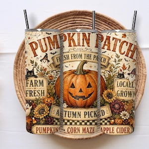 May include: A cylindrical tumbler with a black straw featuring a fall-themed design. The print includes a large jack-o'-lantern, sunflowers, ghosts, and black cats. Text reads PUMPKIN PATCH, FRESH FROM THE PATCH, FARM FRESH, LOCALLY GROWN, and AUTUMN PICKED.