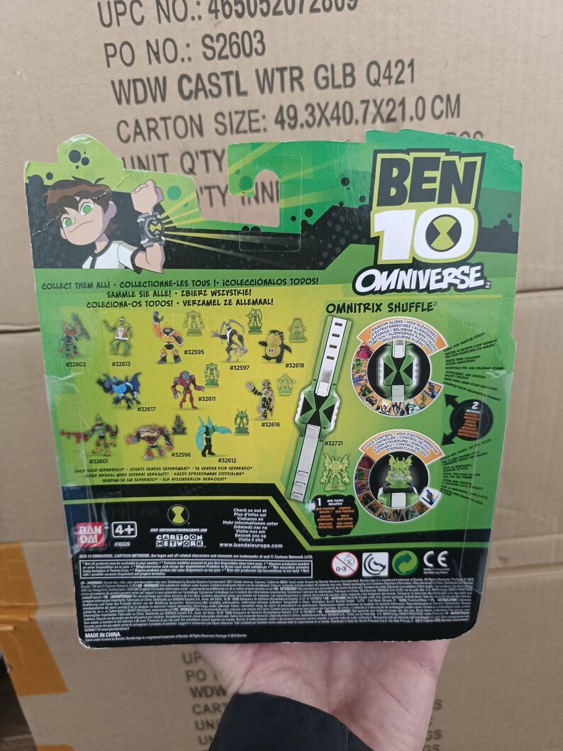 May include: A Ben 10 Omniverse toy package with a green and black color scheme. The package features cartoon illustrations of characters and the Omnitrix Shuffle game. The carton size is 19.4 x 16 x 8.3 inches.
