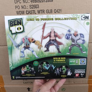 May include: A Ben 10 Figure Collection box featuring three action figures: Vilgax, Aggregor, and Vulkanus. The box also displays Ben 10 DVD & Figures. The Cartoon Network logo is visible. The box is on a cardboard surface.