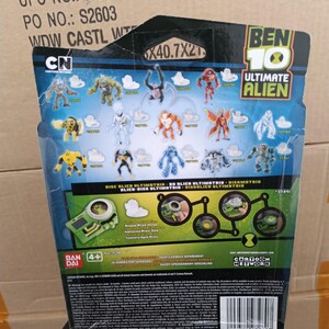 May include: A Ben 10 Ultimate Alien action figure package. The package features various alien figures and the Cartoon Network logo. The dimensions are 40.7 x 21 cm.