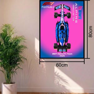 May include: A rectangular wall poster featuring a top-down view of a blue and pink BWT Alpine F1 Team A525 race car. The poster includes the Formula 1 logo, BWT Alpine branding, and measures 60 cm by 80 cm as indicated by the visible dimension lines.