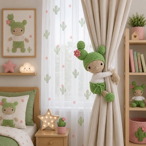 May include: A crochet doll designed as a curtain tieback, featuring a green cactus-shaped hat with a pink flower, a white long-sleeved top, and green shorts. The doll has tan skin, black eyes, and arms wrapped around a beige curtain fabric.
