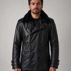 May include: Black leather double-breasted coat with a faux fur collar. The coat features a notched lapel, multiple buttons, and buckle details on the sleeves. A classic outerwear piece.