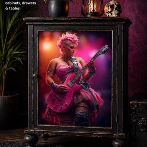 May include: Black cabinet with distressed finish, featuring a framed image of a person playing a pink electric guitar. The cabinet is adorned with a skull, a lantern, and a potted plant. The text "1. FURNITURE" is visible.