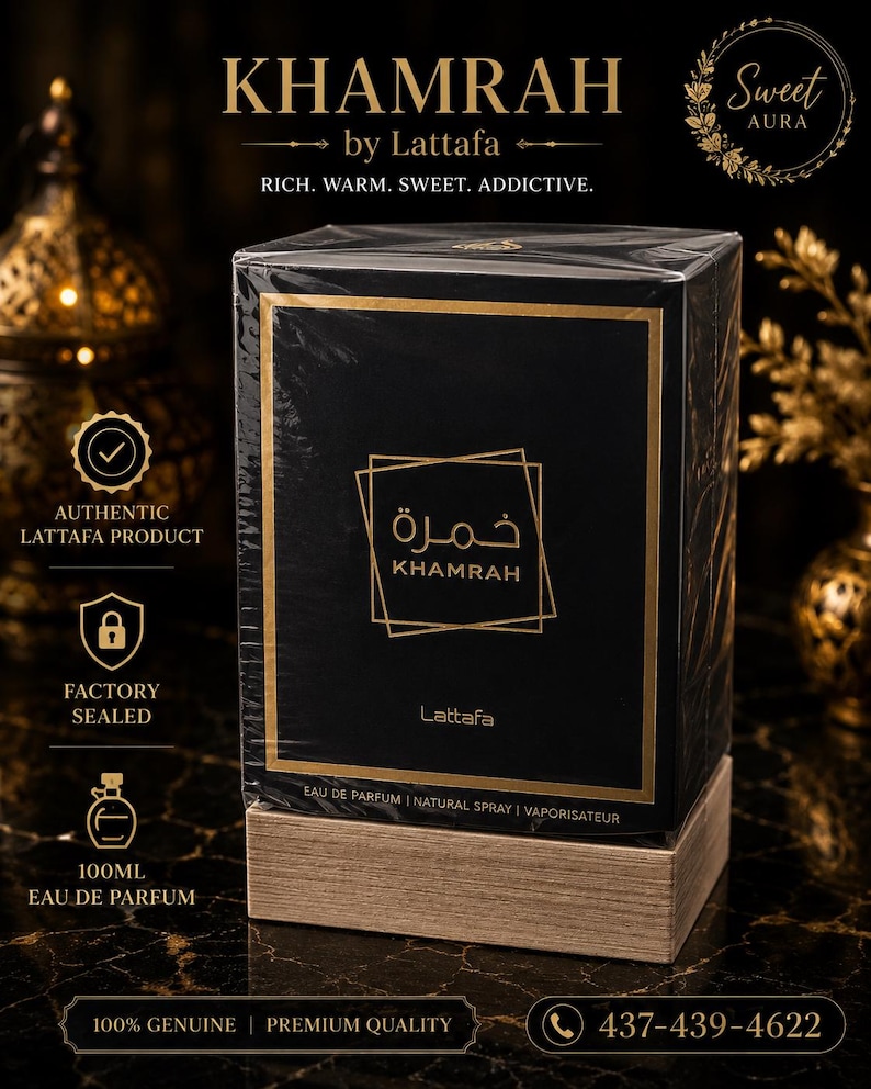 May include: A black rectangular perfume box labelled Khamrah by Lattafa with gold text and accents. The box is wrapped in clear plastic and sits on a light brown wooden base. The text reads Eau de Parfum, Natural Spray, and 100ml.