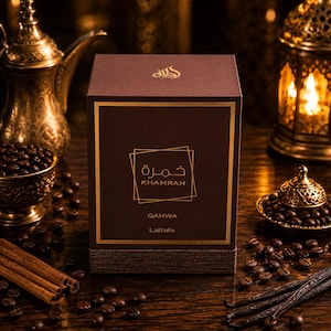 May include: A square brown perfume box with gold lettering featuring the text Khamrah Qahwa Lattafa. The box is centered with a gold border and a geometric square design. The top of the box displays an Arabic script logo in gold ink.