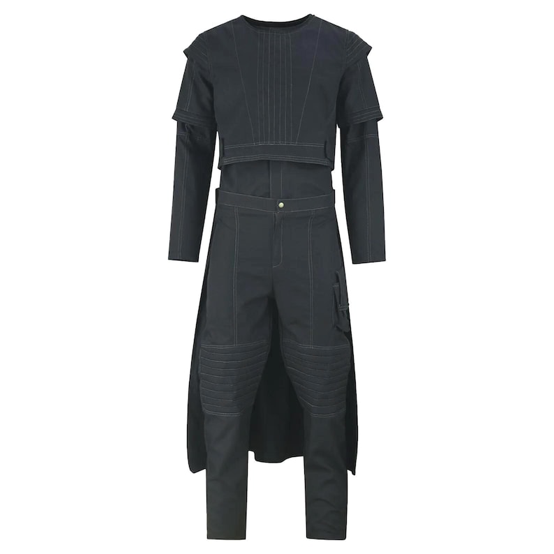 May include: A dark gray two-piece outfit with white stitching. The top has long sleeves and a cropped overlay. The pants have a cargo pocket and knee padding. The outfit is designed with a futuristic aesthetic.