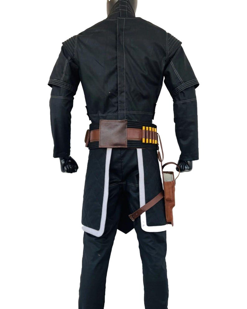 May include: Black costume with white edging, a brown belt, and a holster. The costume features a jacket with short sleeves and a high collar. The belt has a brown leather pouch and several gold cylinders. The trousers have white trim.