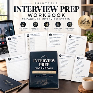 May include: A printable 19-page job interview prep workbook system featuring a dark blue cover with mountain imagery, multiple interior pages with checklists, research templates, and practice questions, alongside a black notebook and pen.