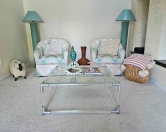 Tubular lucite and chrome coffee table