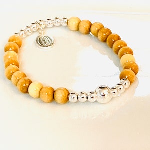 Our Lady of Guadalupe  .925 Sterling and natural wood Rosary Bracelet