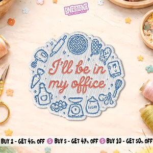May include: A circular embroidered patch featuring the text I'll be in my office in coral red thread. The background is white with blue stitched icons of baking tools including a rolling pin, whisk, oven mitt, apron, scale, and measuring spoons.