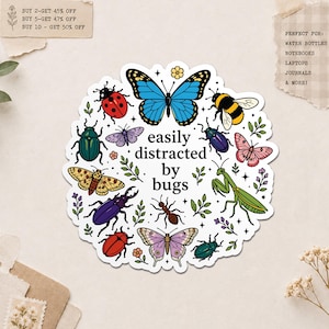 May include: A circular sticker featuring various colorful insects and the phrase "easily distracted by bugs." The design includes a blue butterfly, ladybug, bee, and other bugs. The sticker is suitable for water bottles, notebooks, and more.