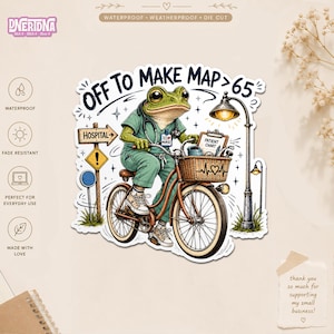 May include: A die-cut sticker featuring a green frog dressed in green medical scrubs and a stethoscope, riding a bicycle. The frog has an ICU nurse badge, a basket with a patient chart, and the text OFF TO MAKE MAP > 65 above the illustration.