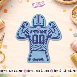 May include: An embroidered patch featuring a football player in a light blue jersey with dark blue trim. The player is flexing both arms, with the text ANYNAME and the number 00 in dark blue thread centered on the back of the jersey.