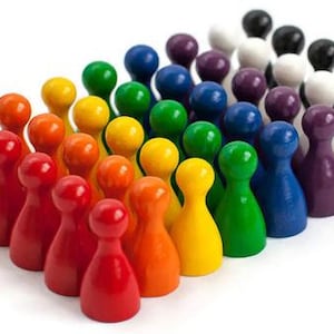 May include: A collection of colorful wooden game pieces arranged in rows. The pieces are in various colors, including red, orange, yellow, green, blue, purple, white, and black. The pieces have a rounded top and a wider base.