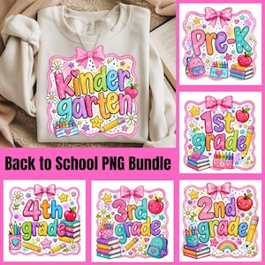 May include: A beige sweatshirt featuring a colorful graphic print with the text Kindergarten, surrounded by illustrations of a pink bow, daisies, stars, a red apple, a pencil, and a box of crayons. The design is part of a school-themed collection.